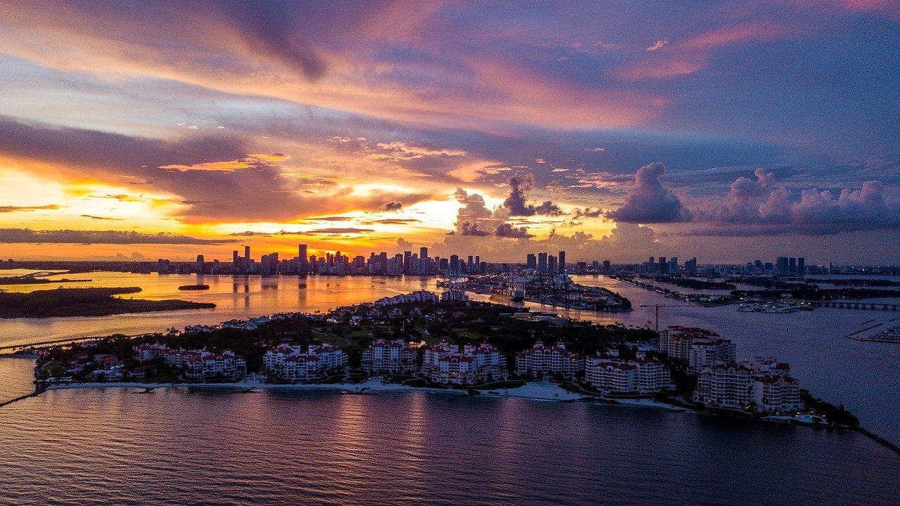 Miami luxury yacht sailing near Star Island mansions